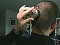 Artist embeds camera in head