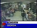 Customer  Fights Robber with a Ladder