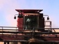 Combine in wheat field