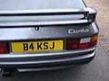 Silver Porsche 944 Turbo with orange rims