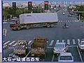 On Camera: Semi Topples In Intersection