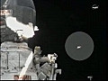 Debris seen floating by NASA cameras outside ISS