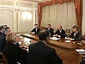 Topolanek-Putin at negotiations table.