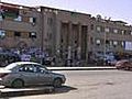 Libya rebels hold ground as refugees flee
