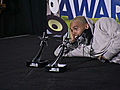 Chris Brown shows off BET awards,  grins