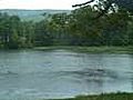 Raining over the pond to say goodbye to campers