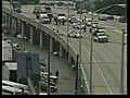 Officer knocked from JFX on life support