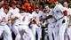 Phillips&#039; homer in 9th stuns Cardinals