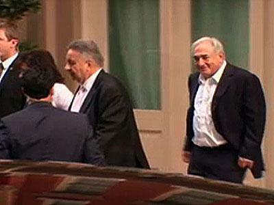 Raw Video: Strauss-Kahn leaves apartment