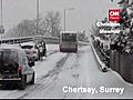 Cars Struggle In English Snow