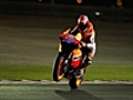 Stoner takes pole in Qatar