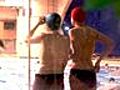 French feminists stage topless protest in swimming pool