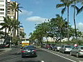 Royalty Free Stock Video HD Footage Traveling in a Van Along the Streets of Waikiki Beach in Hawaii