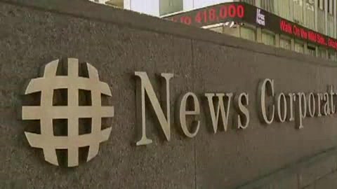 Two top Murdoch execs resign