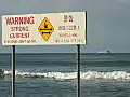 Royalty Free Stock Video HD Footage Strong Surf Sign at Waikiki Beach in Honolulu,  Hawaii