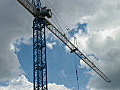 Royalty Free Stock Video HD Footage Zoom Out from a Tower Crane at a Construction Site in Orlando,  Florida