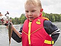 Boy Catches First Fish