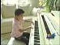 Piano Prodigy Wows Crowds For Brother