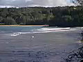 Royalty Free Stock Video SD Footage Zoom Out to Coastline and Waves on Beach in Kauai,  Hawaii