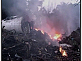 Raw Video: Plane crash wreckage in Congo