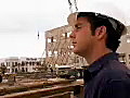 Royalty Free Stock Video SD Footage General Contractor Watches Heavy Equipment at a Construction Site in Ft. Lauderdale,  Florida