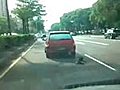 Dog Tied To A Car In Taiwan