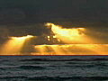 Royalty Free Stock Video SD Footage Zoom Into Storm Clouds From Coastline at Sunrise in Kauai,  Hawaii