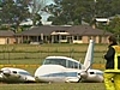 Light plane crashes in backyard