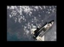 Shuttle Discovery docks with ISS