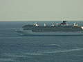 Royalty Free Stock Video HD Footage Crusie Ship Departs Fort Lauderdale Beach as Viewed from the 29th Floor of a Condo