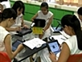 Singapore school swaps books for iPads