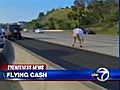 VIDEO: Cash on a highway
