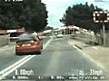 Car smashes through level crossing barrier in high speed police chase