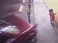 This  little girl was nearly hit in a dramatic crash