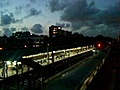 Amazingly Mumbai sky prepares ground for monsoon as railway commuters criss cross on platform