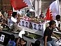 Thousands rally at funeral