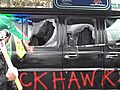 A Canucks fan smashes up a Blackhawks van as part of a radio promotion prior to Game 1 on Wednesday night.