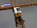 Royalty Free Stock Video SD Footage Zoom Out From the Top of a Tower Crane Operating at a Construction Project in Ft. Lauderdale,  Florida