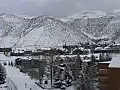 Royalty Free Stock Video HD Footage Pan Right of Mountains and City Area on a Winter’s Day in Beaver Creek,  Colorado