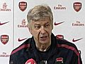 Wenger fights to raise spirits