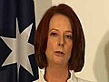 Gillard resumes job as PM