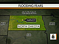 Flood threats force new evacuations in N.D.