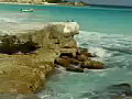 Royalty Free Stock Video SD Footage Scenic View of Coastline,  Waves and Birds Sitting on Rocks on Cancun Beach in Mexico