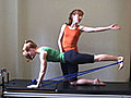 Pilates Exercise: Kick Back With Exercise Band